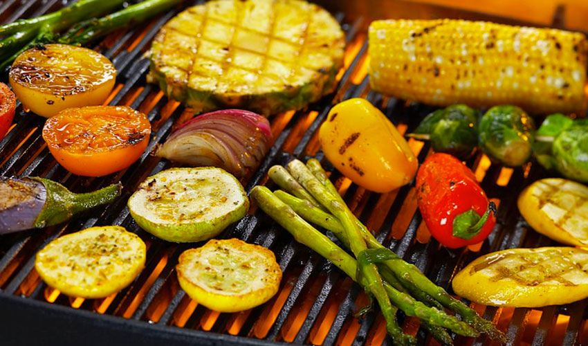 Vegetales asados. Choclo, pimientos, tomates